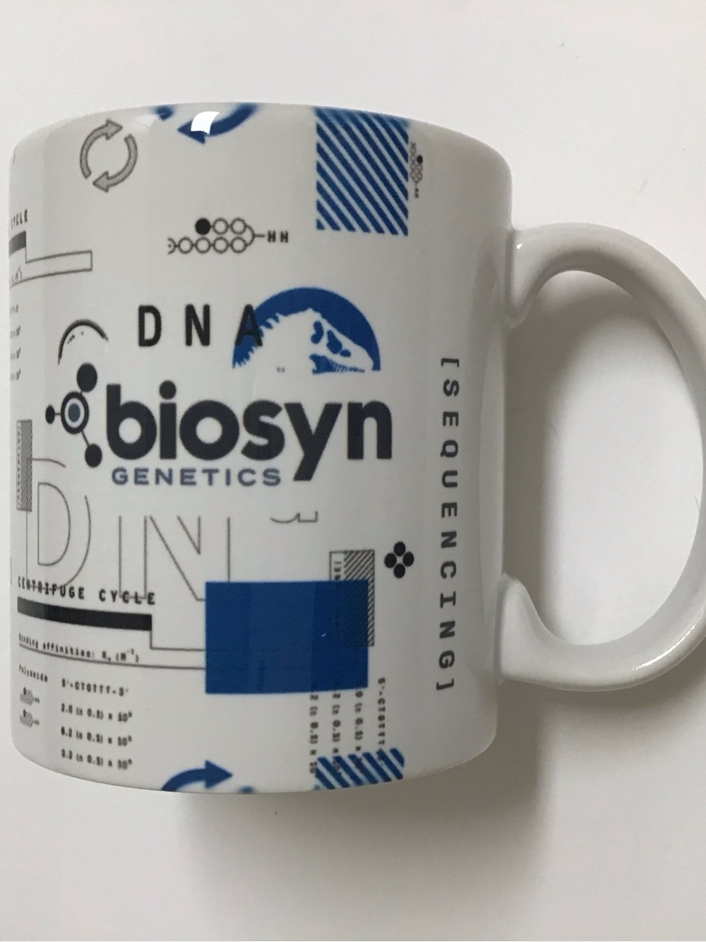 Jurassic World Coffee Mug Universal Studios Park DNA Biosyn Genetics Dinosaurs